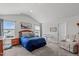 Bright main bedroom featuring vaulted ceiling, soothing color palette, sitting area, and plentiful natural light at 124 Lahinch Dr, Fuquay Varina, NC 27526