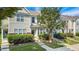 Charming townhome with manicured landscaping and welcoming front entrance in a lovely neighborhood at 127 Cedar Elm Rd, Durham, NC 27713