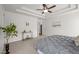 Spacious bedroom featuring tray ceilings, ceiling fan and natural light at 1308 Snyder St, Durham, NC 27713