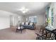 Bright and airy living room with neutral tones and plenty of seating at 1308 Tyson Loop Rd, Spring Hope, NC 27882