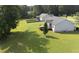 Spacious backyard featuring a wooden deck and partial fencing, perfect for outdoor enjoyment and entertaining at 139 His Way, Middlesex, NC 27557