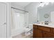 This bathroom offers a shower-tub combo with a curtain, a toilet, and a single-sink vanity at 139 His Way, Middlesex, NC 27557