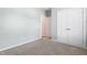 This bedroom has neutral decor and features an entryway and a closet with louvered doors at 139 His Way, Middlesex, NC 27557