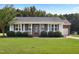 Charming one-story home with a well-maintained lawn and inviting front porch at 139 His Way, Middlesex, NC 27557
