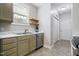 Kitchen featuring stainless steel appliances, marble countertops and shelving at 139 His Way, Middlesex, NC 27557