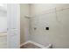 Laundry room with washer/dryer hookups and wire shelving for storage at 139 His Way, Middlesex, NC 27557
