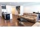Spacious living room with hardwood floors, neutral paint, and plenty of natural light at 1402 Southpoint Trl, Durham, NC 27713