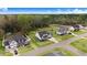 Aerial view of home and neighborhood in a forested area at 147 Everwood Dr, Four Oaks, NC 27524