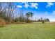 Expansive backyard featuring a large grassy area, perfect for outdoor activities and relaxation at 147 Everwood Dr, Four Oaks, NC 27524