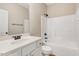 Clean bathroom with a white vanity, shower-tub combination, and modern fixtures at 147 Everwood Dr, Four Oaks, NC 27524
