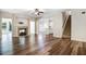 Inviting living room features a cozy fireplace, hardwood floors, and an open layout at 147 Everwood Dr, Four Oaks, NC 27524