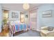 Inviting bedroom with hardwood floors, natural light, and minimalist decor at 1516 Edgevale Rd, Durham, NC 27701