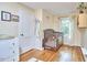 Well-lit Bedroom with hardwood floors, a wooden crib, and bright window at 1516 Edgevale Rd, Durham, NC 27701