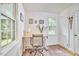 Well-lit home office featuring a rolling chair and decor at 1516 Edgevale Rd, Durham, NC 27701