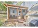 Relaxing outdoor patio area next to the house, perfect for entertaining and enjoying nature at 1516 Edgevale Rd, Durham, NC 27701