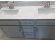 Elegant bathroom vanity featuring dual sinks, modern fixtures, and ample storage space at 1524 Chirping Bird Ct, Cary, NC 27519