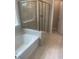 Spa-like bathroom with a soaking tub and a separate glass-enclosed shower at 1524 Chirping Bird Ct, Cary, NC 27519