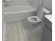 Bathroom includes a soaking tub, toilet, and tiled floor at 1524 Chirping Bird Ct, Cary, NC 27519