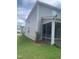 Exterior view of a newly built home with a screened in porch at 1524 Chirping Bird Ct, Cary, NC 27519