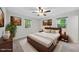 Cozy bedroom with a large bed, natural light from the windows, and tasteful decor at 1601 Redmond Dr, Durham, NC 27712