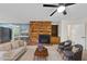 Inviting living room features a brick fireplace, comfortable seating, and stylish decor at 1601 Redmond Dr, Durham, NC 27712