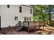 The backyard features a wood deck, an outdoor area ideal for relaxing and entertaining at 1609 Falls Ct, Raleigh, NC 27615