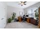 Bedroom with neutral walls, large window and two desks at 1918 Morning Fog Dr, Fuquay Varina, NC 27526