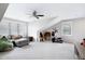 Spacious bonus room offering a comfortable seating area and exercise equipment at 1918 Morning Fog Dr, Fuquay Varina, NC 27526