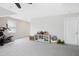 Neutral bonus room with ample space for recreation and relaxation and an easy access to an extra storage at 1918 Morning Fog Dr, Fuquay Varina, NC 27526