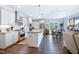 Bright, open kitchen with stainless steel appliances, granite countertops, and a large island at 1918 Morning Fog Dr, Fuquay Varina, NC 27526