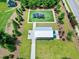 Overhead shot of a community playground with colorful equipment and a picnic shelter at 1918 Morning Fog Dr, Fuquay Varina, NC 27526