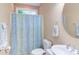 Clean bathroom with a shower, toilet, and sink, offering essential functionality at 2012 Silverleaf Dr, Youngsville, NC 27596