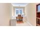 Bright office space with built-in desk, storage, and natural light from the window at 2012 Silverleaf Dr, Youngsville, NC 27596
