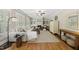 Comfortable living room with a fireplace, plush seating, and bright natural light at 204 Edgepine Dr, Holly Springs, NC 27540