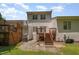 Exterior rear view of the home highlighting a deck, stairs and lawn at 25 Silver Pl # Apt B, Angier, NC 27501