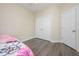 This cozy bedroom features wood-look flooring and a double door closet at 25 Silver Pl # Apt B, Angier, NC 27501