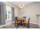 Charming dining area featuring a round table and a window offering natural lighting at 25 Silver Pl # Apt B, Angier, NC 27501