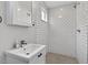 Modern bathroom with a shower stall, white subway tile, and pedestal sink at 2503 Shirley St, Durham, NC 27705