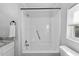 Modern bathroom with a tub and shower combo and a window for natural light at 2503 Shirley St, Durham, NC 27705
