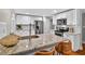Beautiful kitchen featuring white cabinets, granite countertops, and stainless steel appliances at 2503 Shirley St, Durham, NC 27705