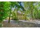 Beautiful home with mature landscaping, manicured lawns, and inviting curb appeal at 2602 Vintage Hill Ct, Durham, NC 27712