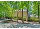 Charming home features a sprawling lawn and tall, mature trees at 2602 Vintage Hill Ct, Durham, NC 27712