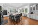 Spacious kitchen with white cabinets, countertops, hardwood floors, and stainless steel appliances at 2602 Vintage Hill Ct, Durham, NC 27712