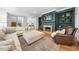 Beautiful living room with a fireplace, built-in bookshelves, and comfortable seating at 2602 Vintage Hill Ct, Durham, NC 27712