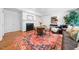 Inviting living room with hardwood floors, fireplace, and cozy seating, perfect for relaxing at 2602 Vintage Hill Ct, Durham, NC 27712