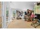 Large walk-in closet has ample storage space, natural light, and well-organized shelves and racks at 2602 Vintage Hill Ct, Durham, NC 27712