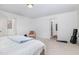 Spacious carpeted bedroom showcases a white interior, complementing the bed, and offering access to a closet at 27 Silver Moon Ln, Clayton, NC 27527
