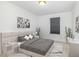 Modern bedroom design with a padded headboard, contemporary nightstands, and sleek decor at 27 Silver Moon Ln, Clayton, NC 27527