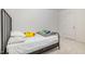 Simple bedroom featuring a bed, soft bedding, and door for easy access at 27 Silver Moon Ln, Clayton, NC 27527