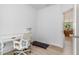Bright office space with a white desk, chair, and an exercise treadmill at 27 Silver Moon Ln, Clayton, NC 27527